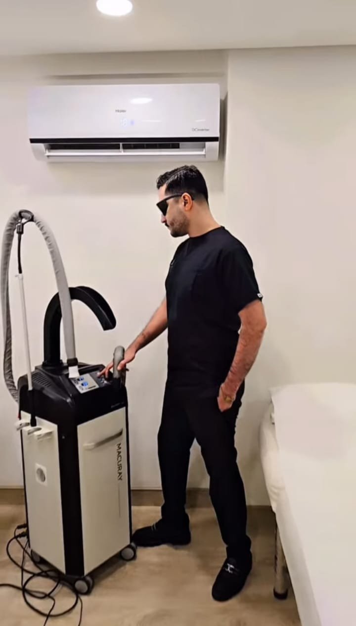 Laser tattoo removal treatment at a clinic in Pakistan