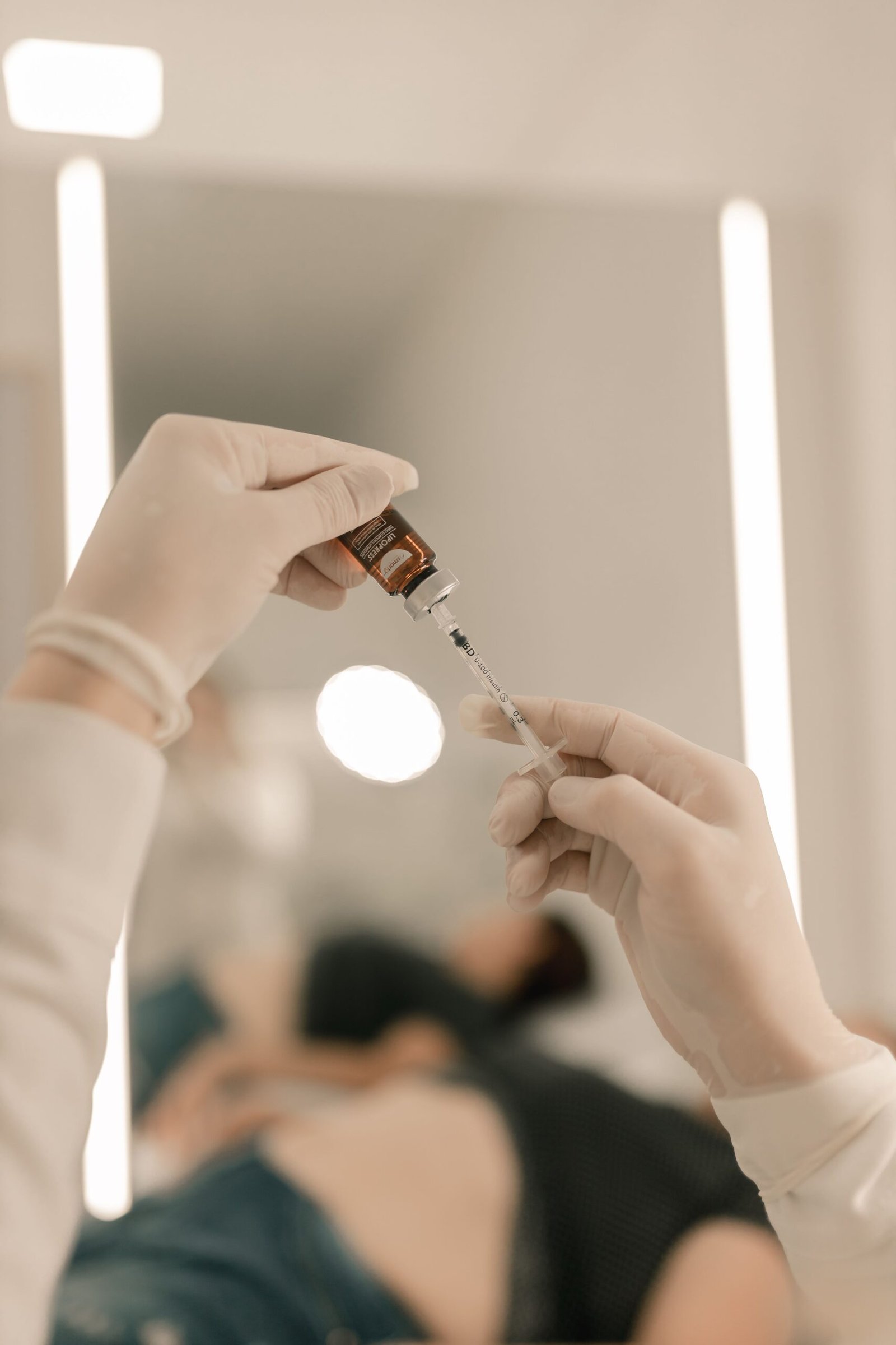 Doctor explaining how Zeptide injection works for weight loss